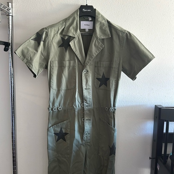 Short sleeve Pistola jumpsuit with stars size medium